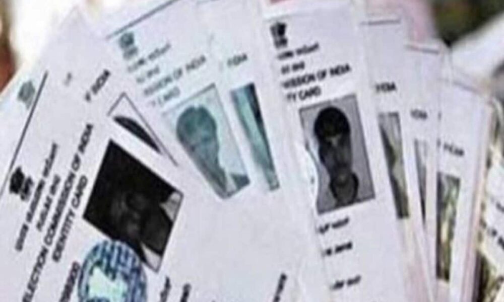two voter cards made on one face warning of action received from speed post