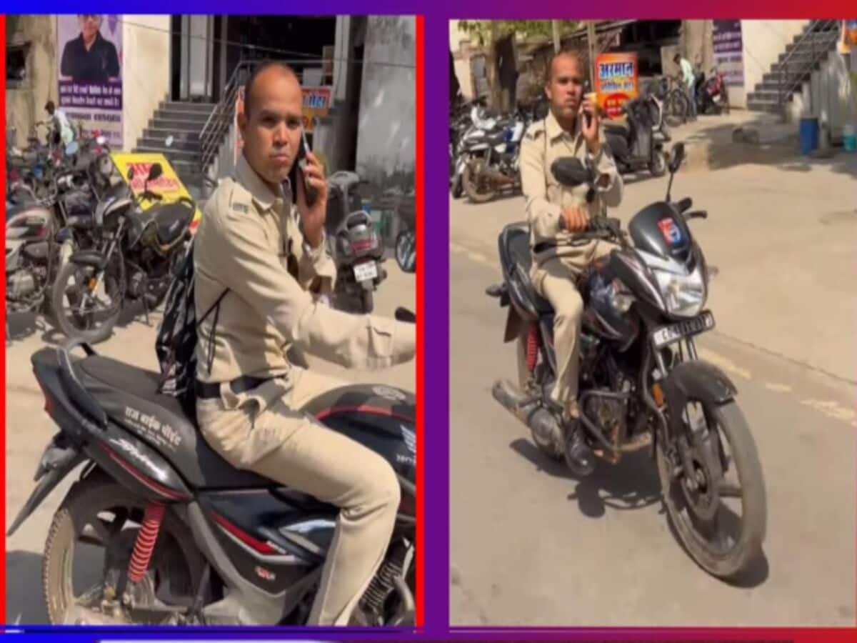 Policeman was driving while talking on the phone video went viral fined Rs 1000 Policeman was driving while talking on the phone video went viral fined Rs 1000