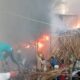 a massive fire broke out in an illegal slum in kanpur more than 100 huts dozens of shops burnt to ashes