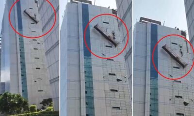 नोएडा की ऊंची बिल्डिंग के शीशे साफ करते हुए टूटा ट्राला, खतरे में पड़ी 2 मजदूरों की जान; VIDEO