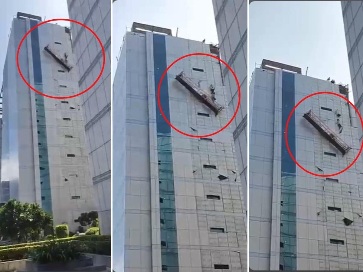 नोएडा की ऊंची बिल्डिंग के शीशे साफ करते हुए टूटा ट्राला, खतरे में पड़ी 2 मजदूरों की जान; VIDEO नोएडा की ऊंची बिल्डिंग के शीशे साफ करते हुए टूटा ट्राला, खतरे में पड़ी 2 मजदूरों की जान; VIDEO
